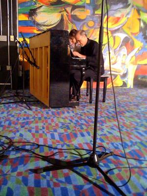 Chancellor George playing a jazz duet with homecoming queen Paige Dubman at the Grand Re-opening of the Pilot House.jpg